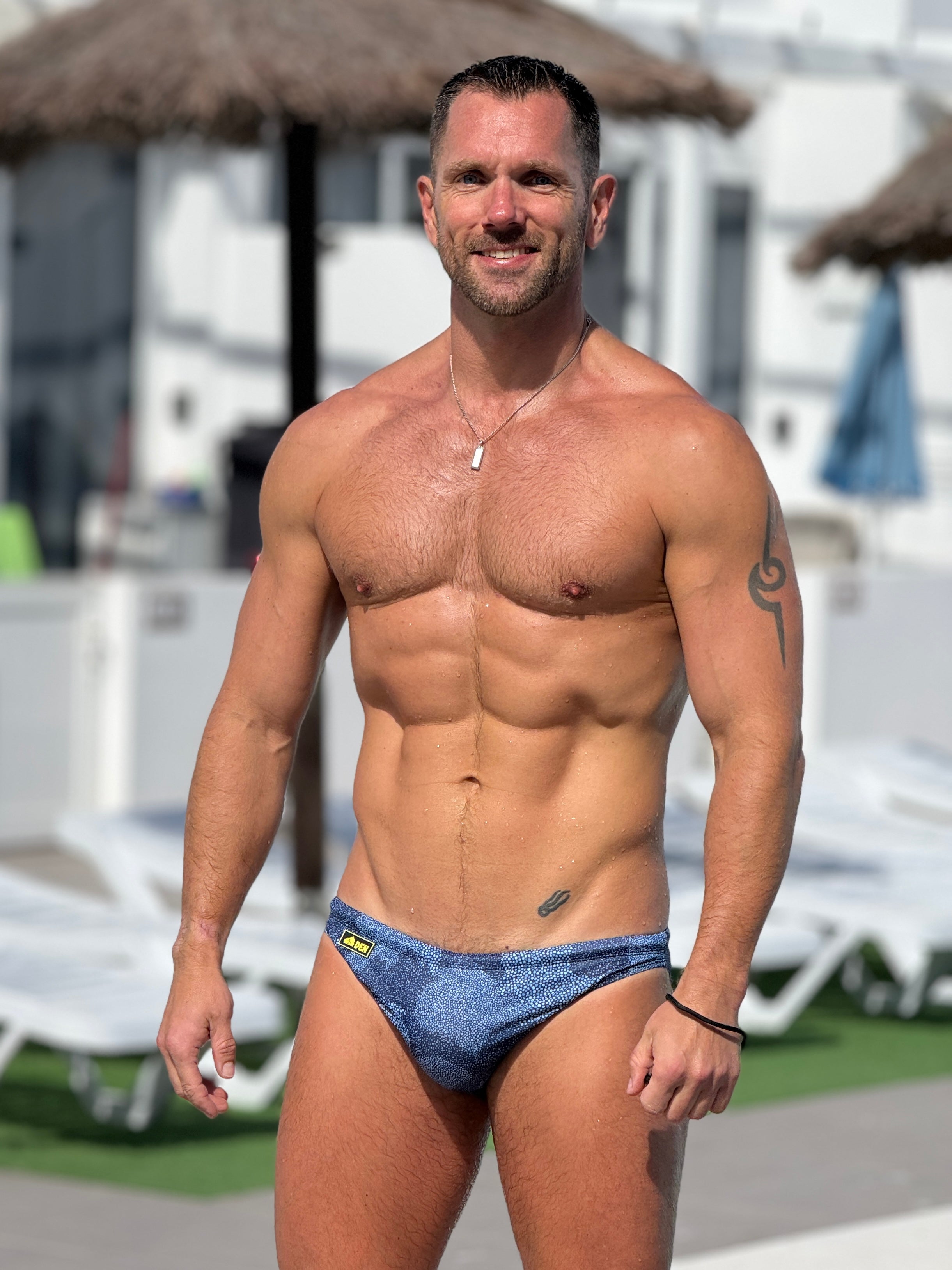 NAVY STINGRAY SKINNY SWIM BRIEF by DEN