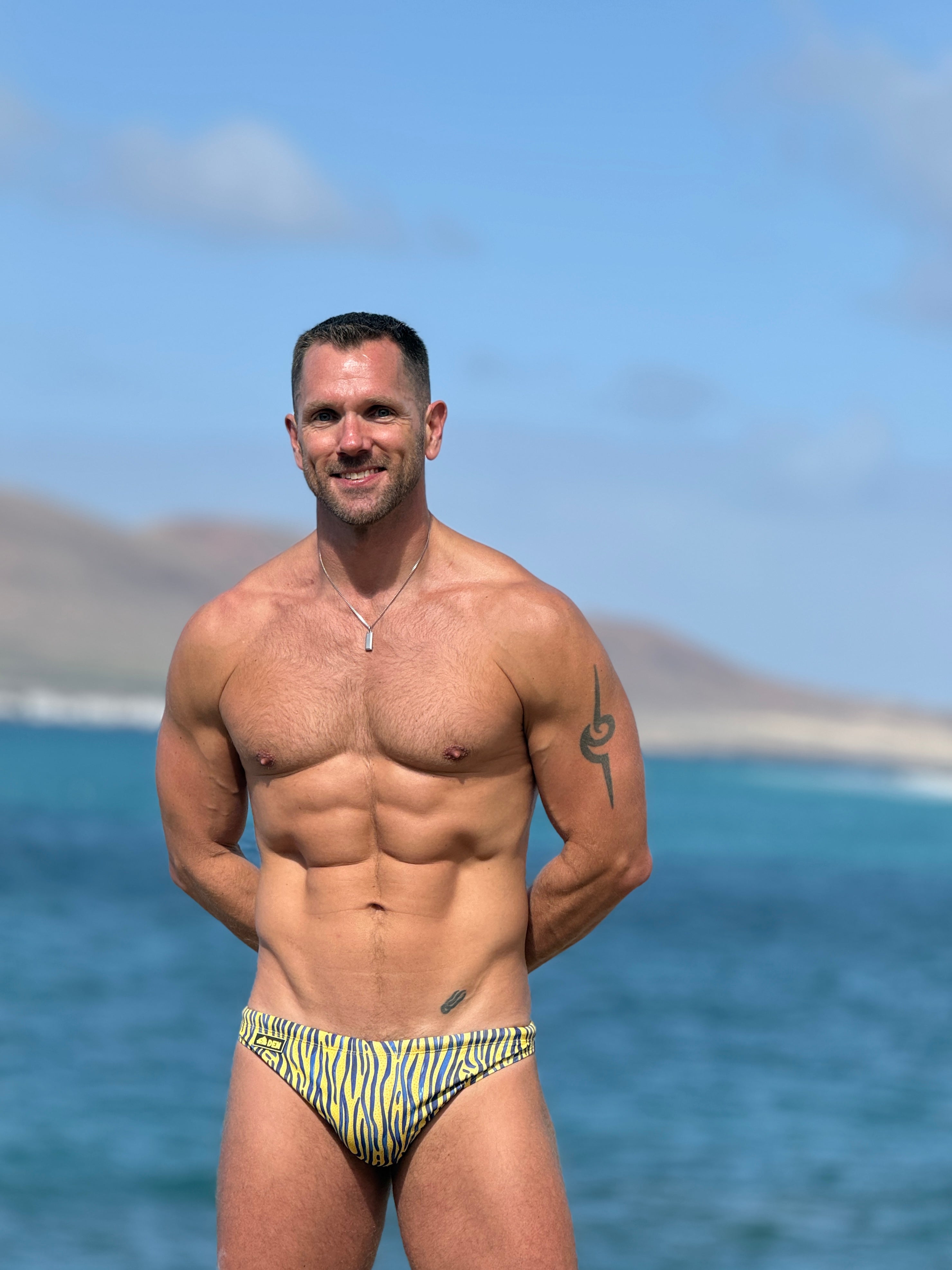 YELLOW STRIPE SKINNY SWIM BRIEF by DEN